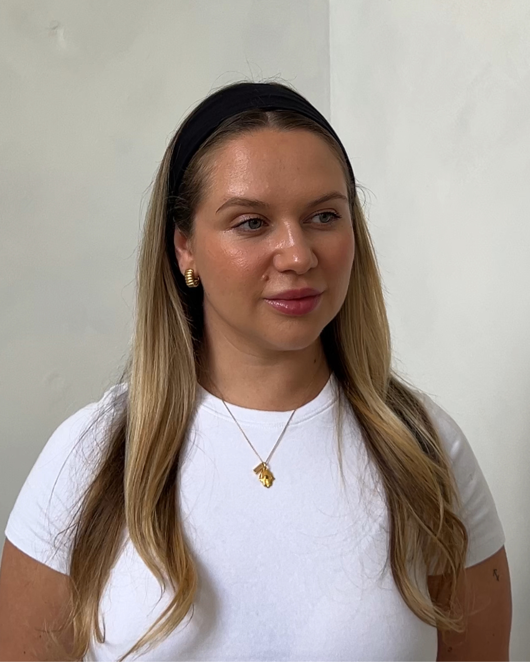 Black satin-lined headband for hair breakage protection